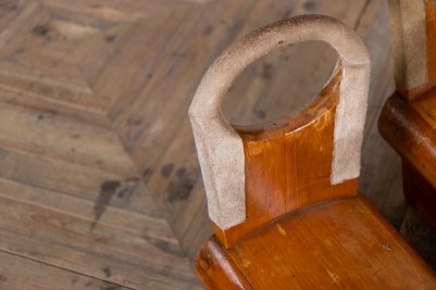 vintage-wooden-gym-saddles-close-up